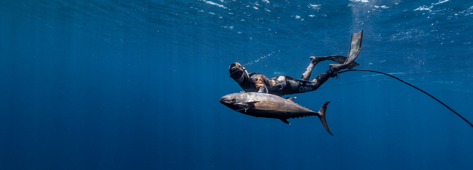 Ocean Guardian USA - THE WORLD'S MOST EFFECTIVE SHARK DETERRENTS - Man spearfishing - SHOP NOW